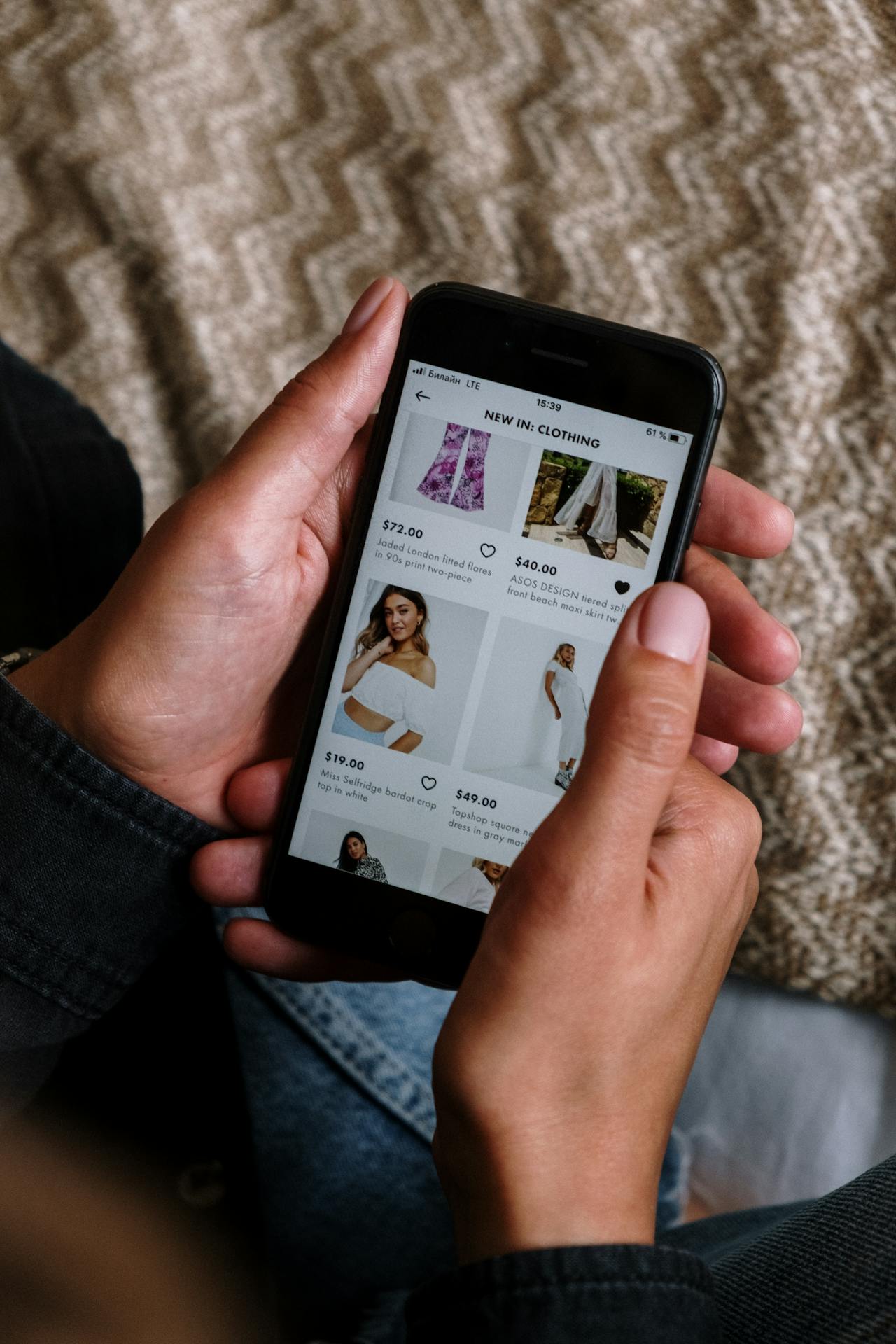 person shopping online on a smartphone